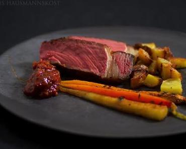 Ochsenkotelett mit gebratenen Wurzeln