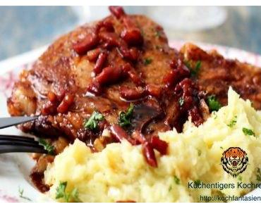 Glasierte Kalbskoteletts mit Speck und Kartoffelbrei